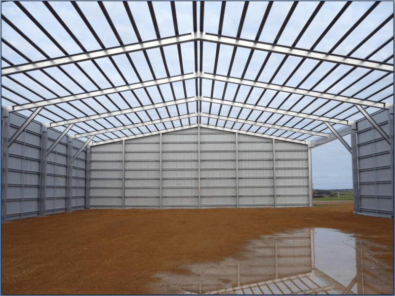 A large metal shed with 12m converter beam