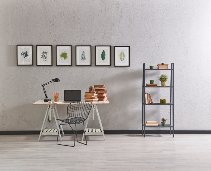 Modern Grey Interior styled with wall art and furniture.